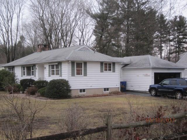 18 Lloyd Road Norwalk, CT 06850 - Photo 1 of 1 a house that has a tree in front of it