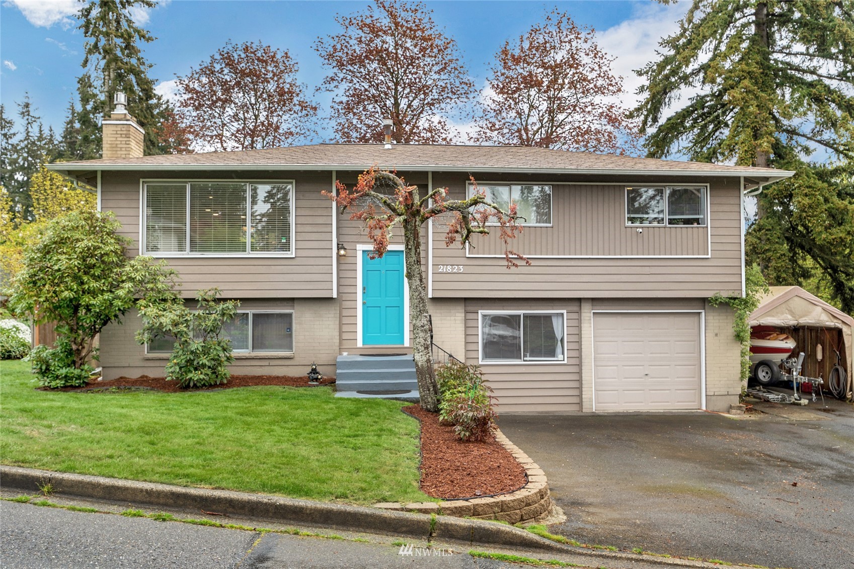 21823 2nd Avenue West Bothell, WA 98021 - Photo 1 of 30 a front view of a house with garden