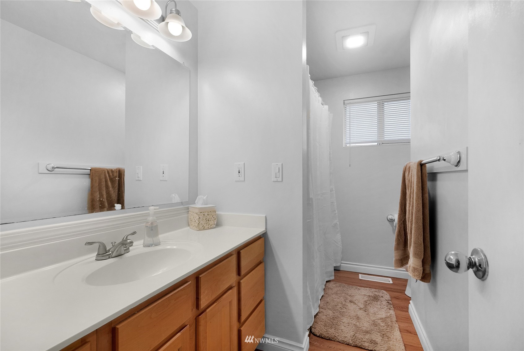 21823 2nd Avenue West Bothell, WA 98021 - Photo 13 of 30 a bathroom with a sink and mirror