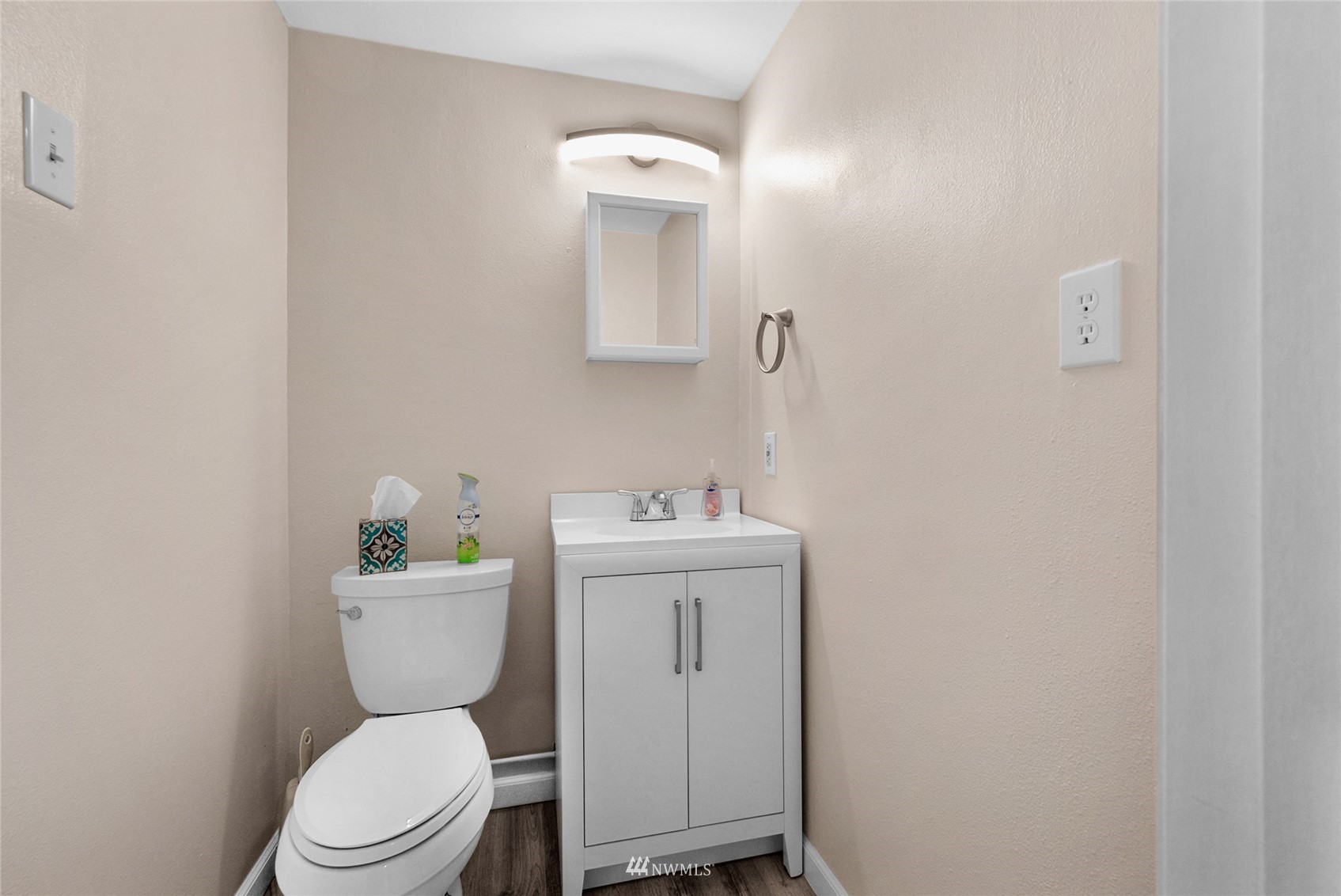21823 2nd Avenue West Bothell, WA 98021 - Photo 21 of 30 a bathroom with a toilet sink vanity and mirror