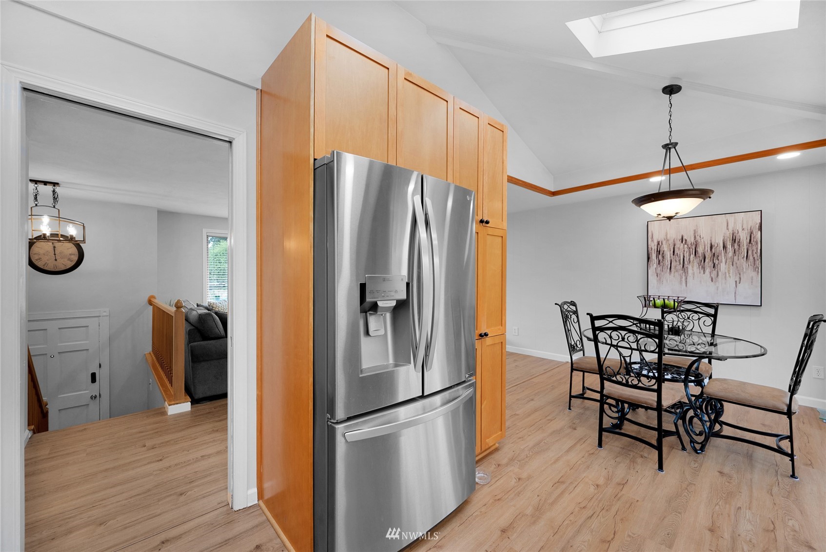 21823 2nd Avenue West Bothell, WA 98021 - Photo 5 of 30 a kitchen with stainless steel appliances granite countertop a refrigerator and a table