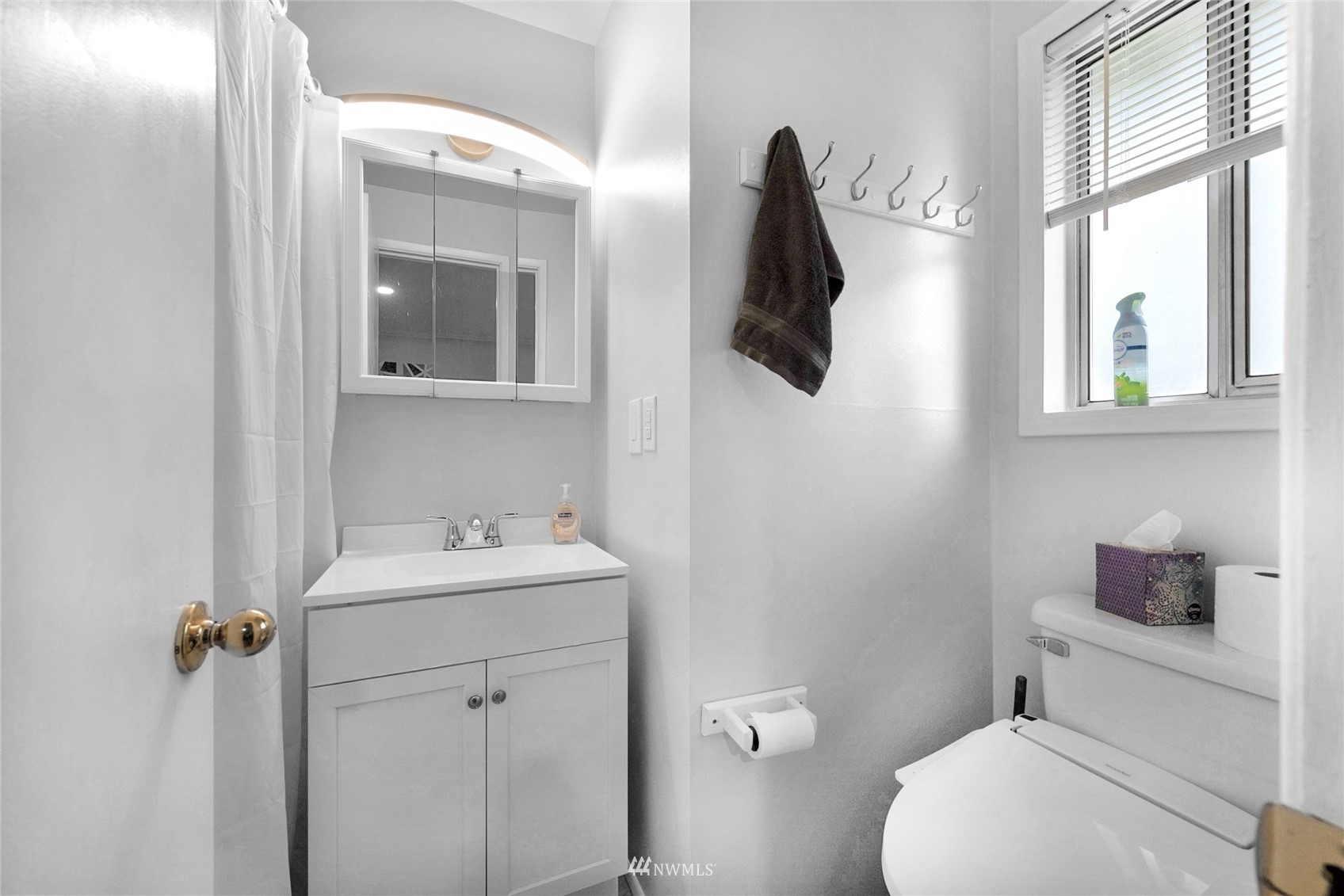 21823 2nd Avenue West Bothell, WA 98021 - Photo 10 of 30 a bathroom with a toilet sink and mirror