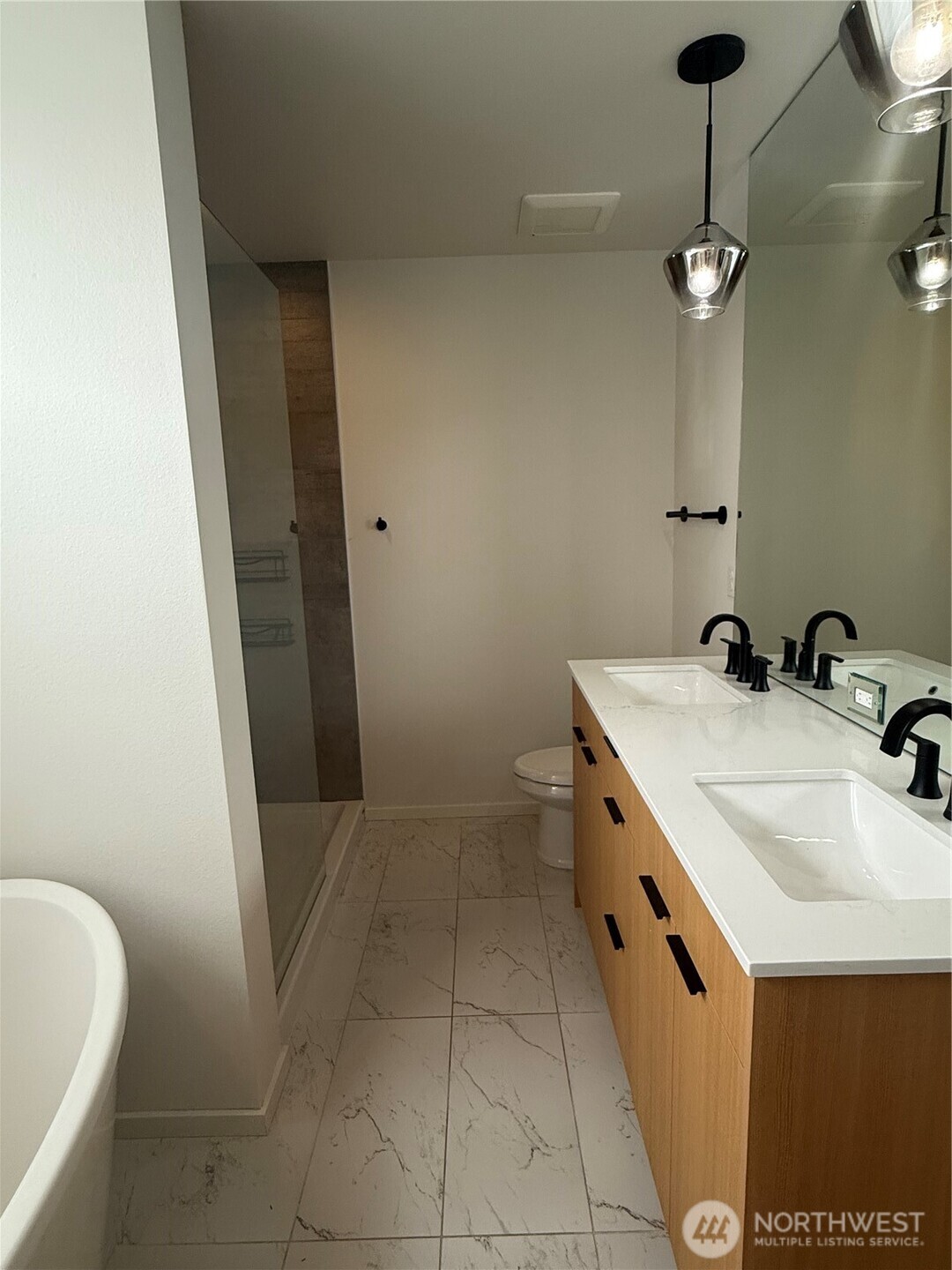 817 24th Avenue South, Unit B Seattle, WA 98144 - Photo 19 of 33 a bathroom with a sink and a mirror