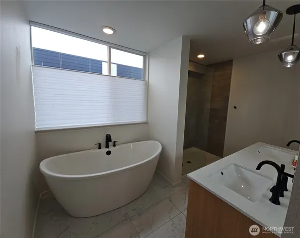 a bathroom with a sink and a bathtub