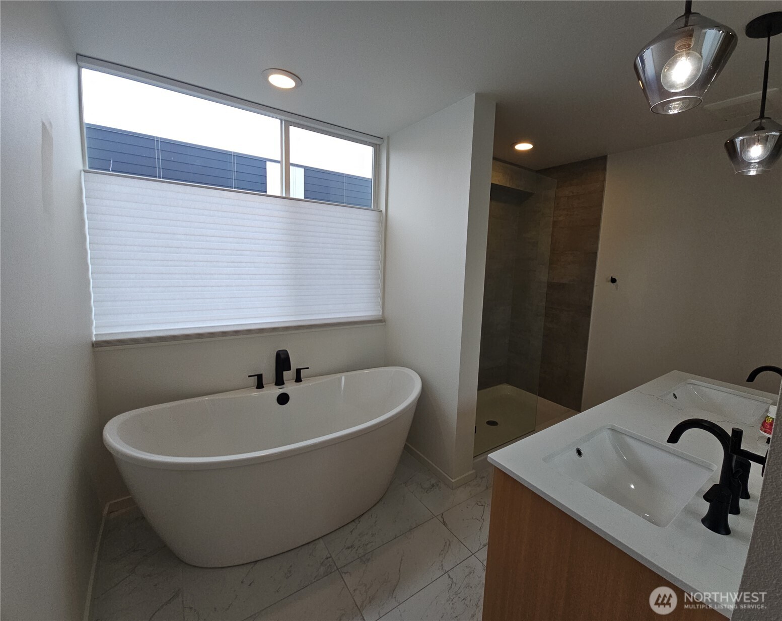 817 24th Avenue South, Unit B Seattle, WA 98144 - Photo 3 of 33 a bathroom with a sink and a bathtub