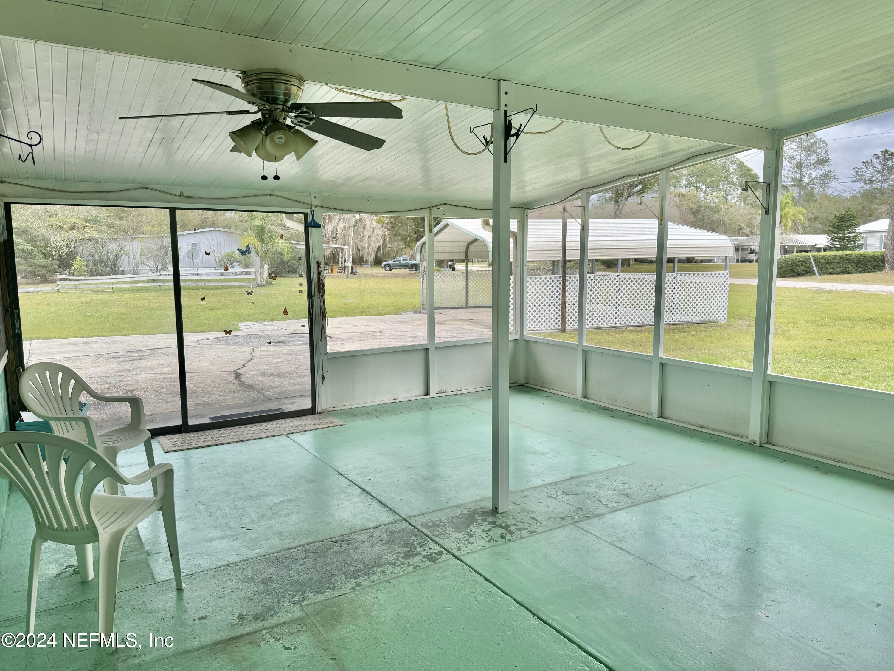 779 Ridgeline Road Satsuma, FL 32189 - Photo 26 of 43 17'x22' Screened Back Porch