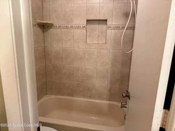 a close view of a bathtub in bathroom