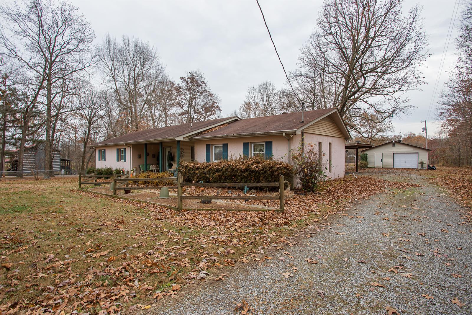 1803 Friendship Road Cross Plains, TN 37049 - Photo 1 of 20 a view of house with a yard covered with large trees