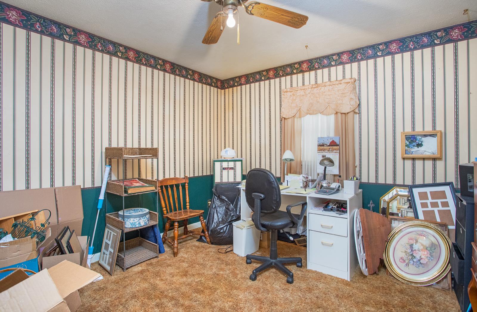 1803 Friendship Road Cross Plains, TN 37049 - Photo 17 of 20 a living room with furniture a rug and a window