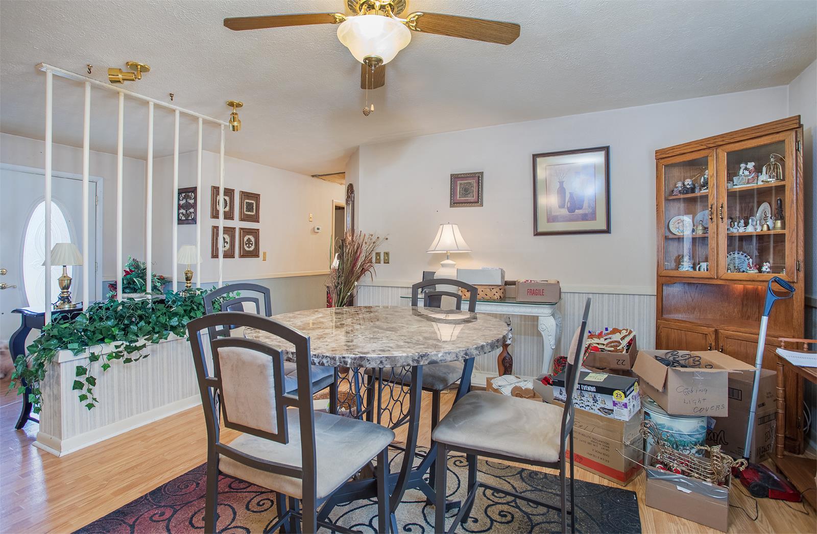 1803 Friendship Road Cross Plains, TN 37049 - Photo 8 of 20 a view of a a dining room with furniture window and wooden floor