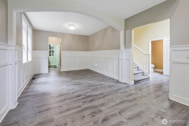 a view of entryway with wooden floor