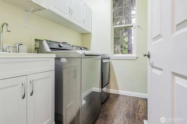 a utility room with dryer and washer