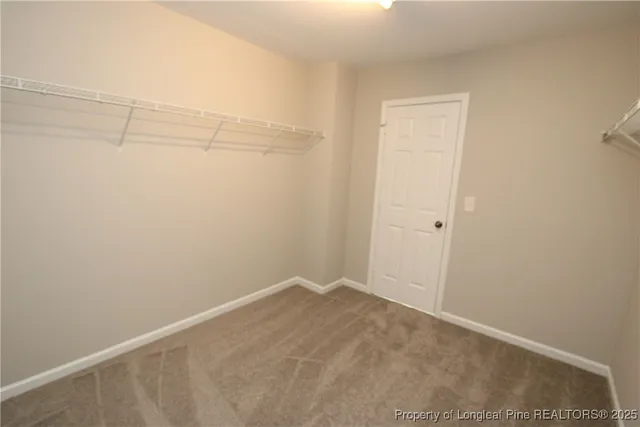 a view of a room with racks on the wall