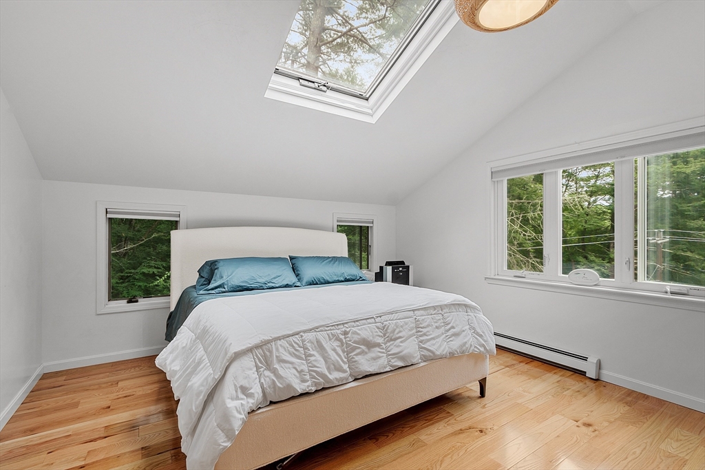 18 Crane Crossing Road Plaistow, NH 03865 - Photo 25 of 36 a bedroom with a bed and window