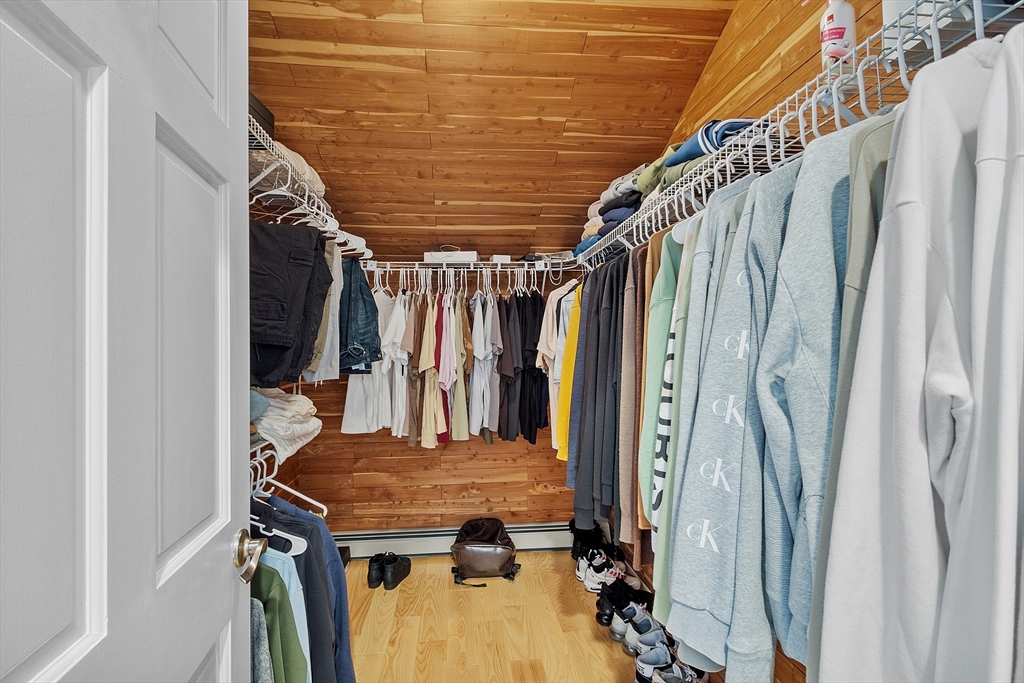 18 Crane Crossing Road Plaistow, NH 03865 - Photo 28 of 36 a view of walk in closet with clothes and shoes