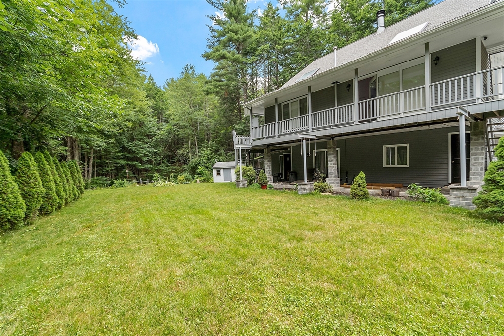 18 Crane Crossing Road Plaistow, NH 03865 - Photo 3 of 36 a front view of house with yard