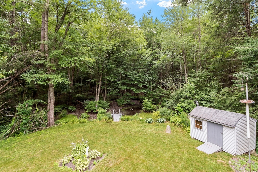 18 Crane Crossing Road Plaistow, NH 03865 - Photo 6 of 36 a view of a garden