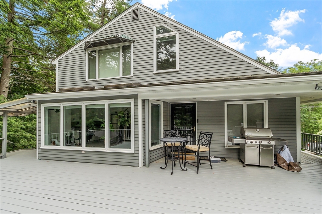 18 Crane Crossing Road Plaistow, NH 03865 - Photo 7 of 36 a view of a house with a patio