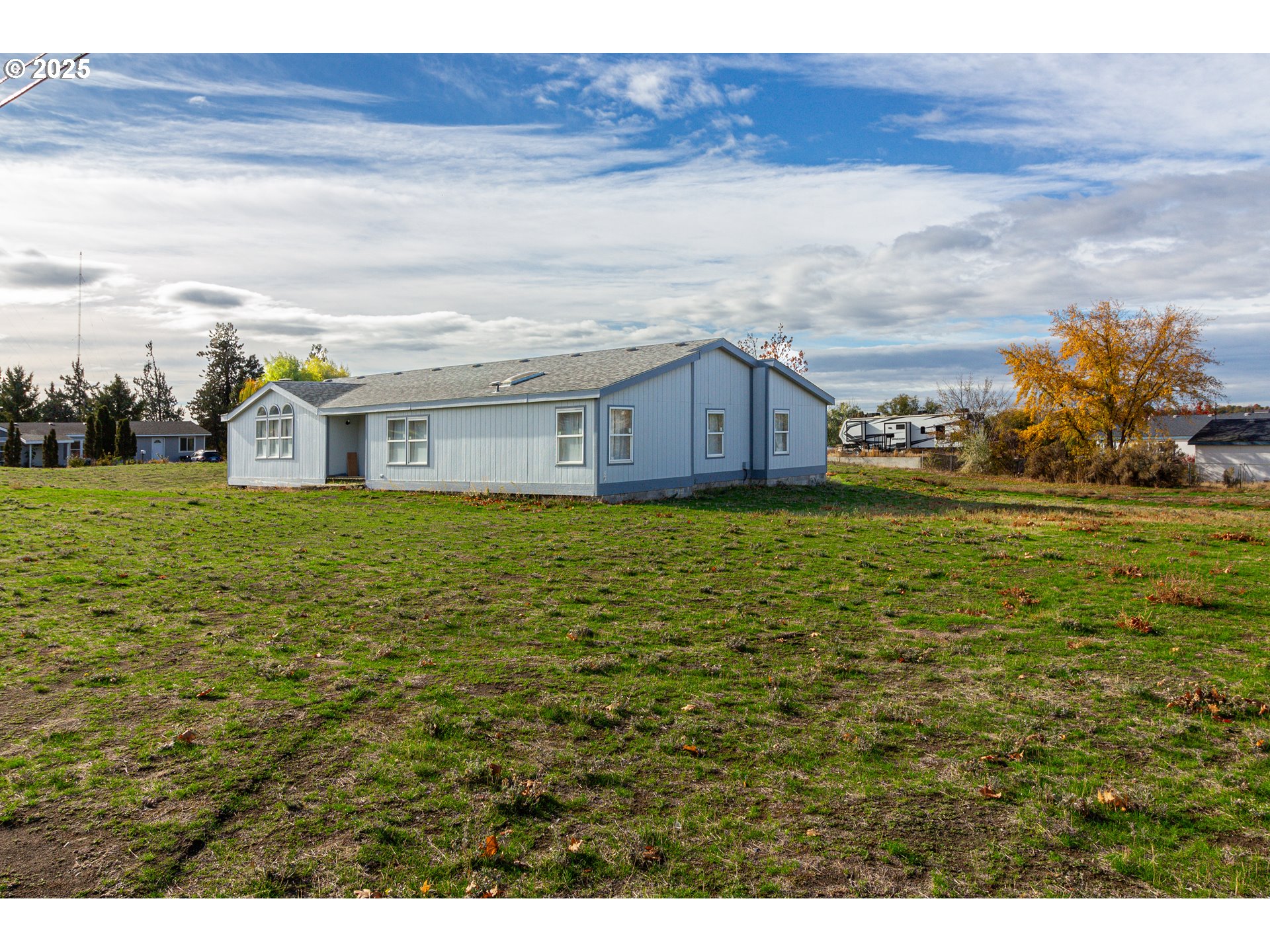 30683 Spring Court Hermiston, OR 97838 - Photo 23 of 29 a view of a house with a yard