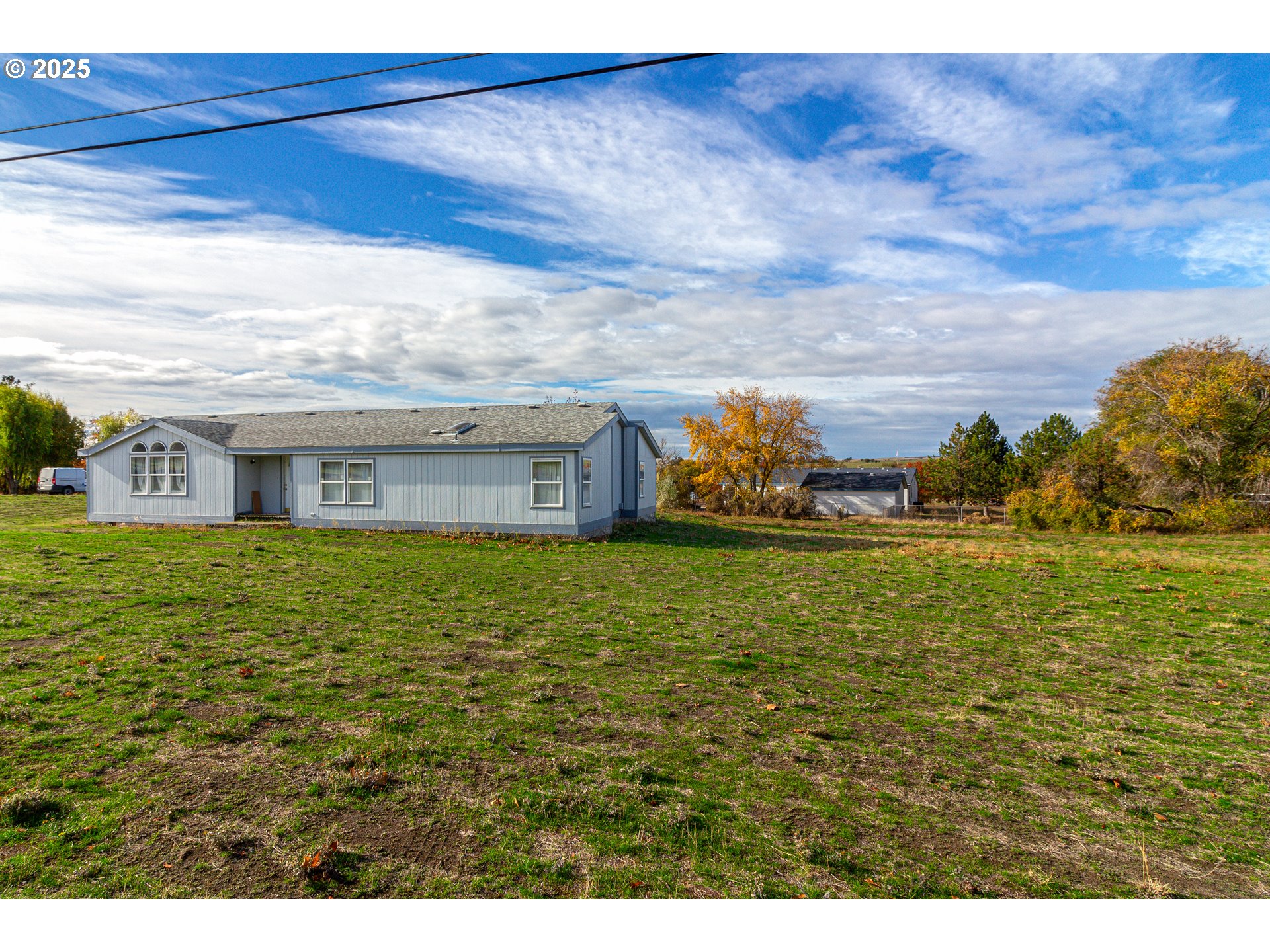 30683 Spring Court Hermiston, OR 97838 - Photo 24 of 29 a front view of a house with a yard