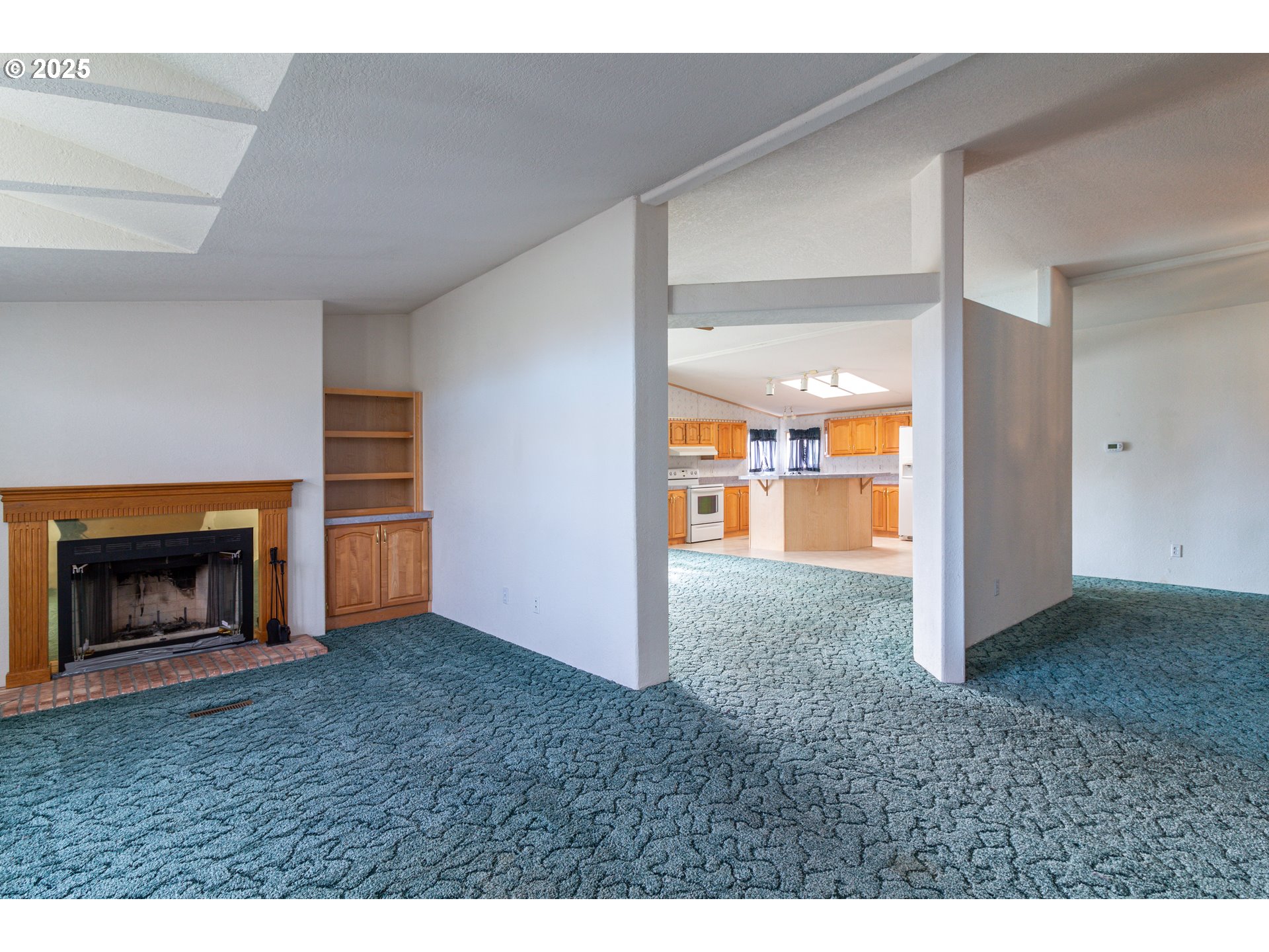 30683 Spring Court Hermiston, OR 97838 - Photo 3 of 29 a view of an empty room and fire place