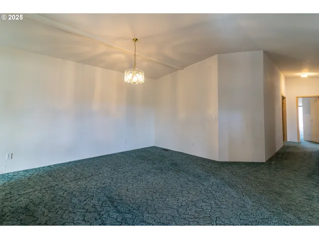 a view of an empty room with window