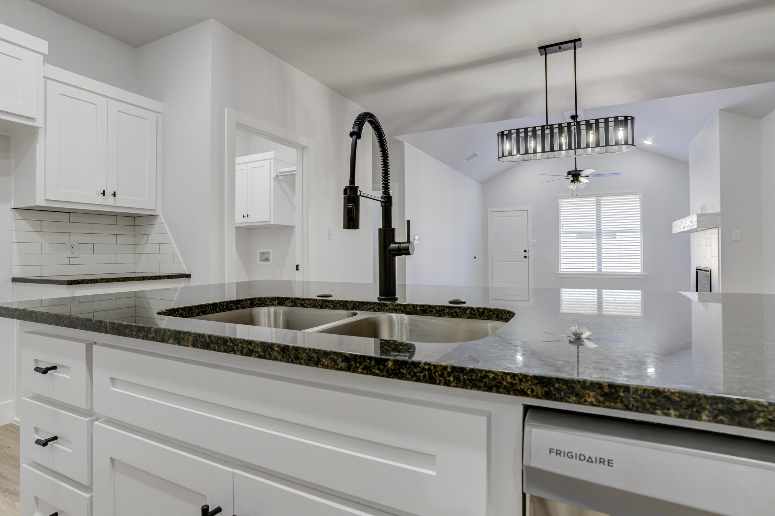 5808 Viola Avenue Lubbock, TX 79407 - Photo 20 of 60 a kitchen with granite countertop a sink and a granite counter tops