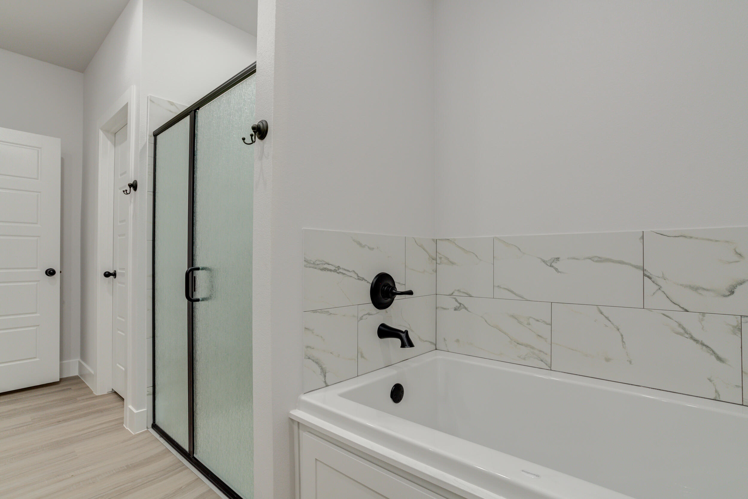5808 Viola Avenue Lubbock, TX 79407 - Photo 43 of 60 a bathroom with a bathtub