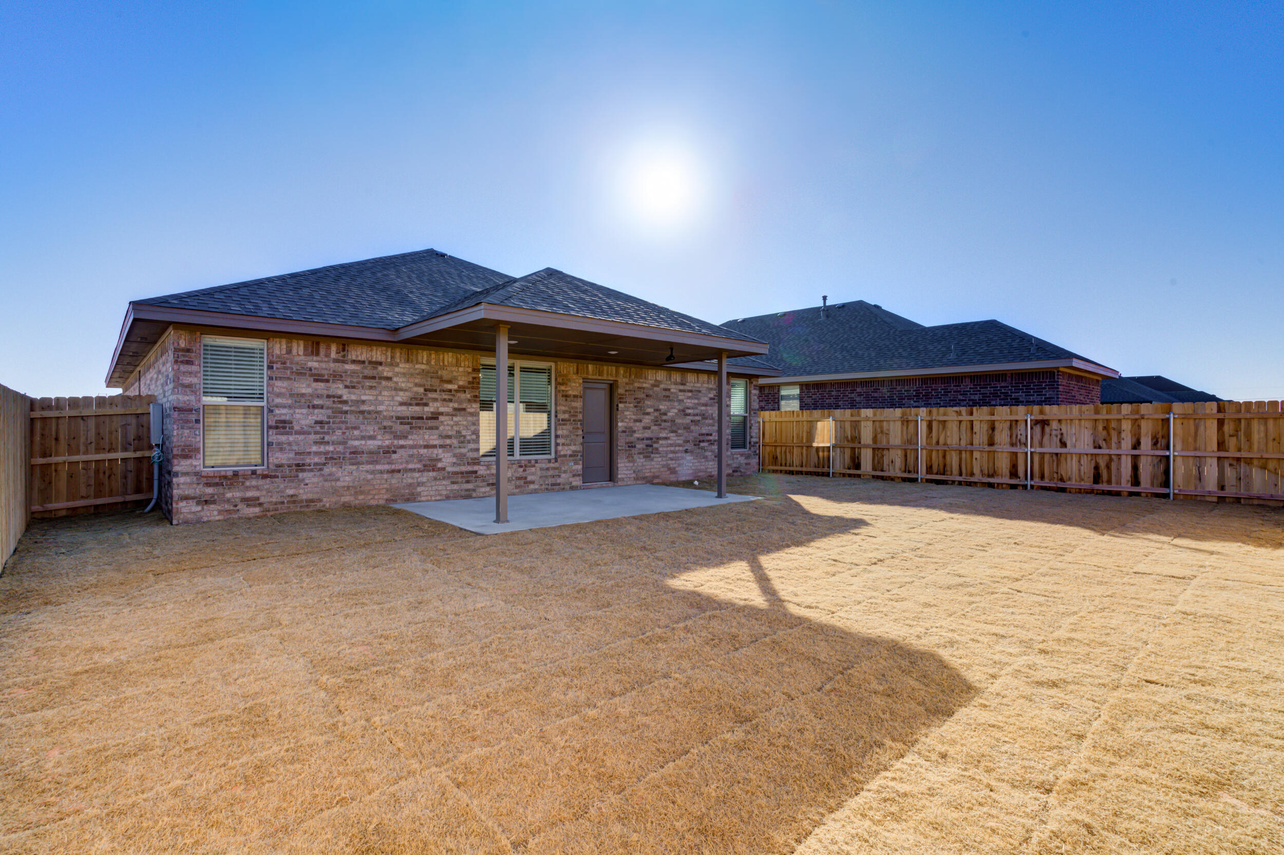 5808 Viola Avenue Lubbock, TX 79407 - Photo 59 of 60 a view of a house with a yard
