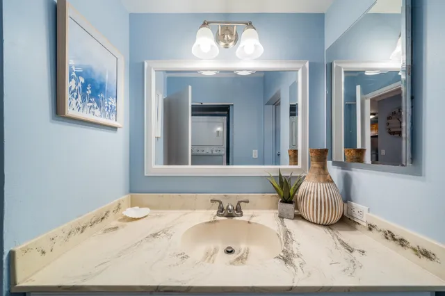 a bathroom with a sink a toilet and a bathtub