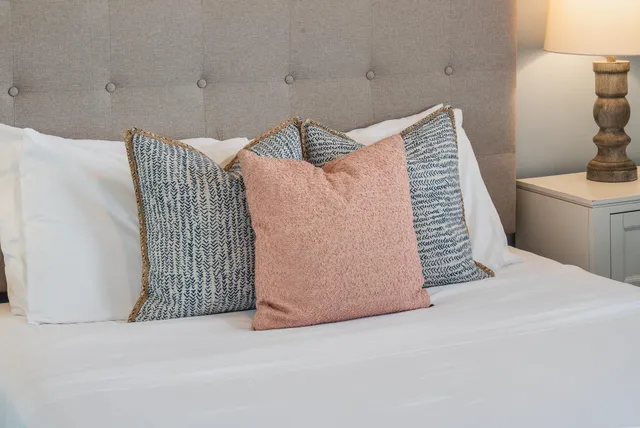 a view of a backyard with sitting area