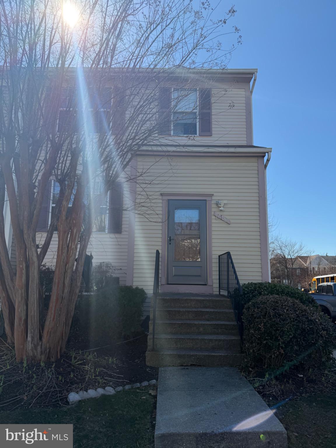 12150 Turnstone Court, Unit 90 Silver Spring, MD 20904 - Photo 1 of 19 a front view of a house with a yard