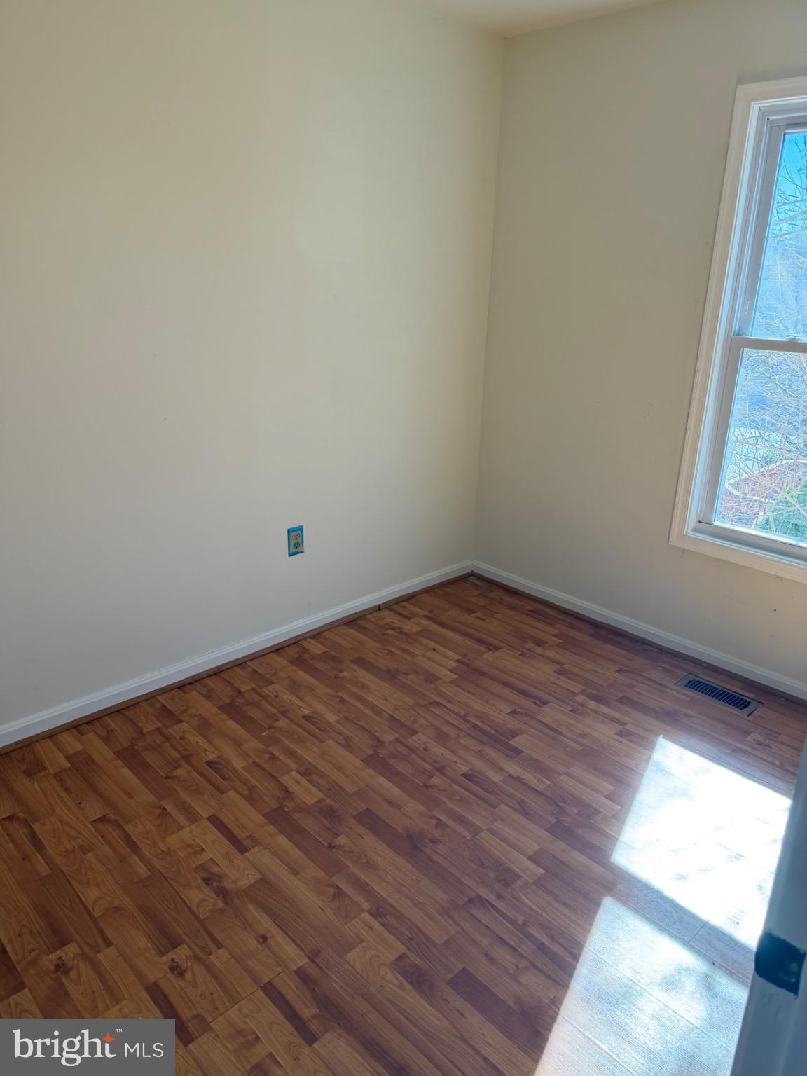 12150 Turnstone Court, Unit 90 Silver Spring, MD 20904 - Photo 18 of 19 a view of empty room with wooden floor and fan