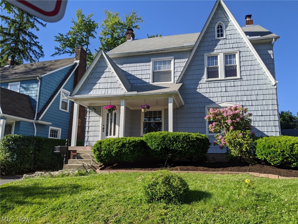 3511 Northcliffe Road Cleveland, OH 44118 - Photo 1 of 46 Shingle-sided exterior with a covered front porch, prominent gables, and a dormer window