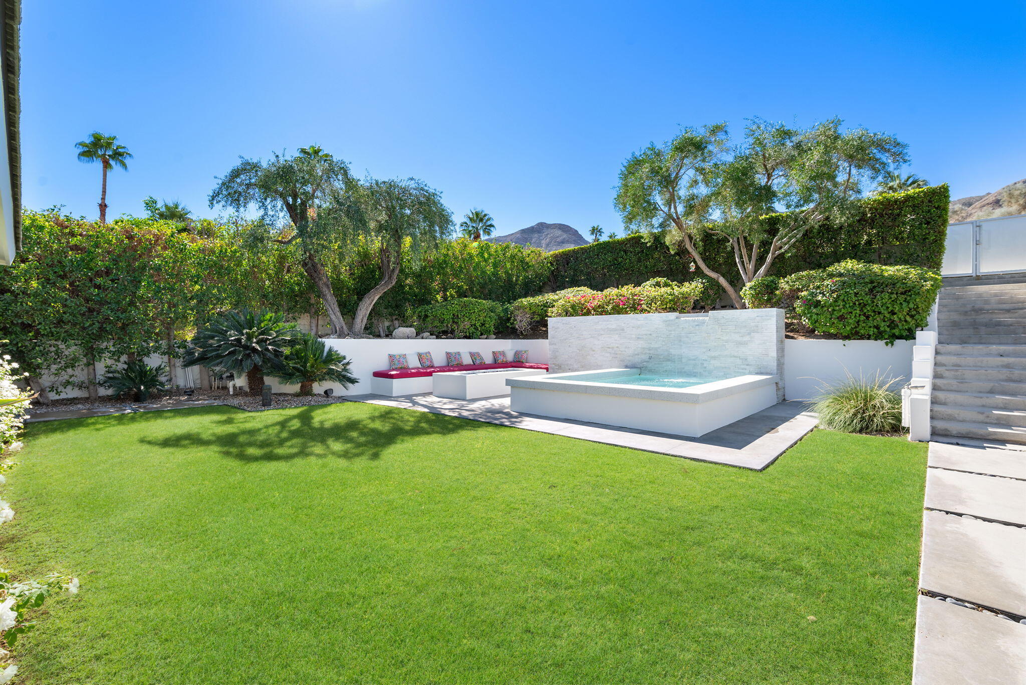 70288 Calico Road Rancho Mirage, CA 92270 - Photo 16 of 72 a view of a garden with an outdoor space