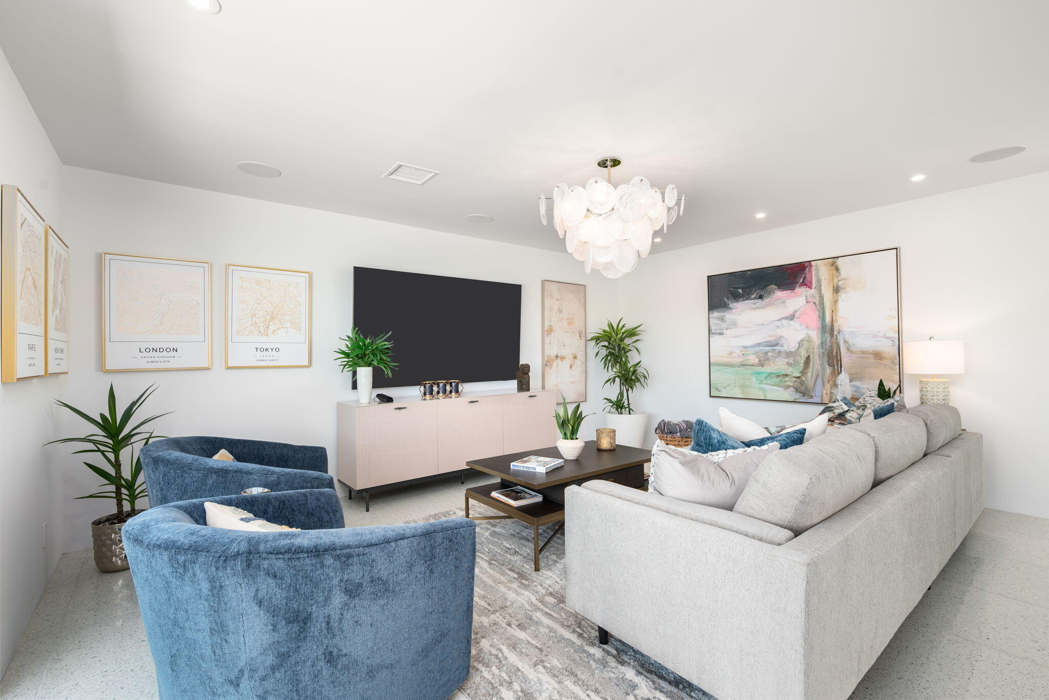 70288 Calico Road Rancho Mirage, CA 92270 - Photo 30 of 72 a living room with furniture and a flat screen tv