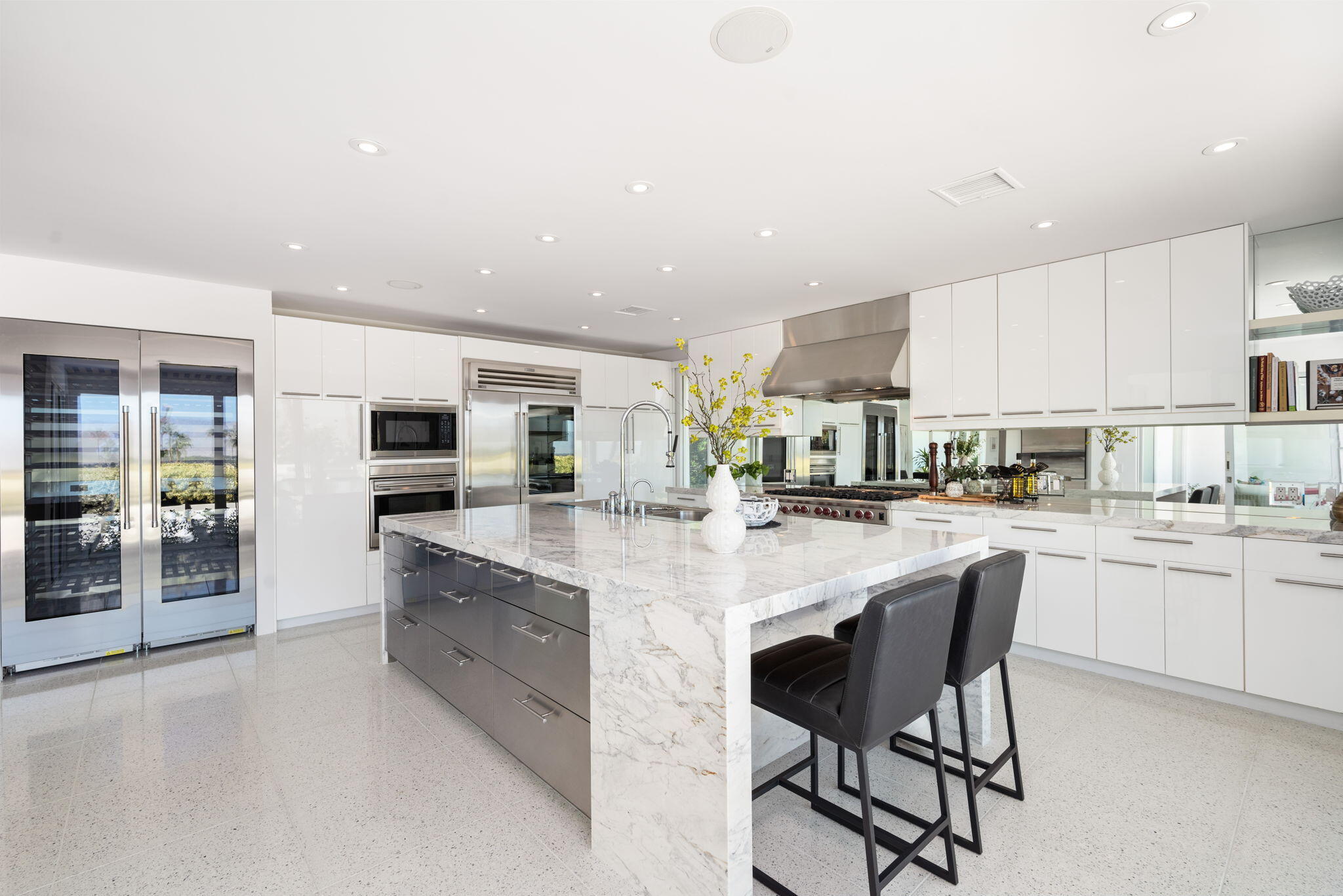 70288 Calico Road Rancho Mirage, CA 92270 - Photo 37 of 72 a kitchen with stainless steel appliances granite countertop a sink and cabinets