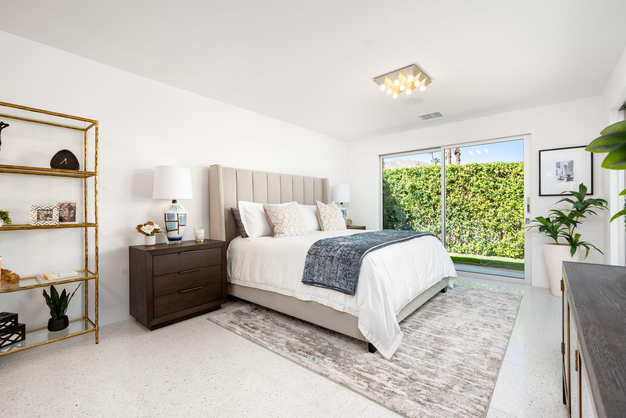 70288 Calico Road Rancho Mirage, CA 92270 - Photo 43 of 72 a bedroom with a bed and a window