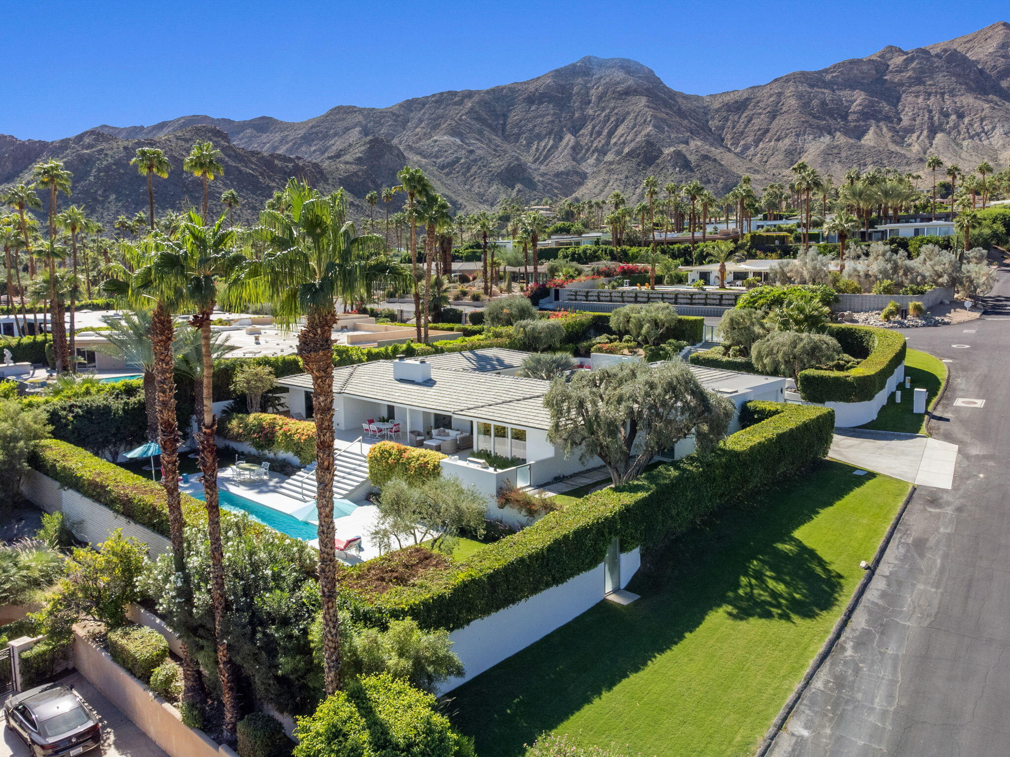 70288 Calico Road Rancho Mirage, CA 92270 - Photo 6 of 72 a view of a house with a garden