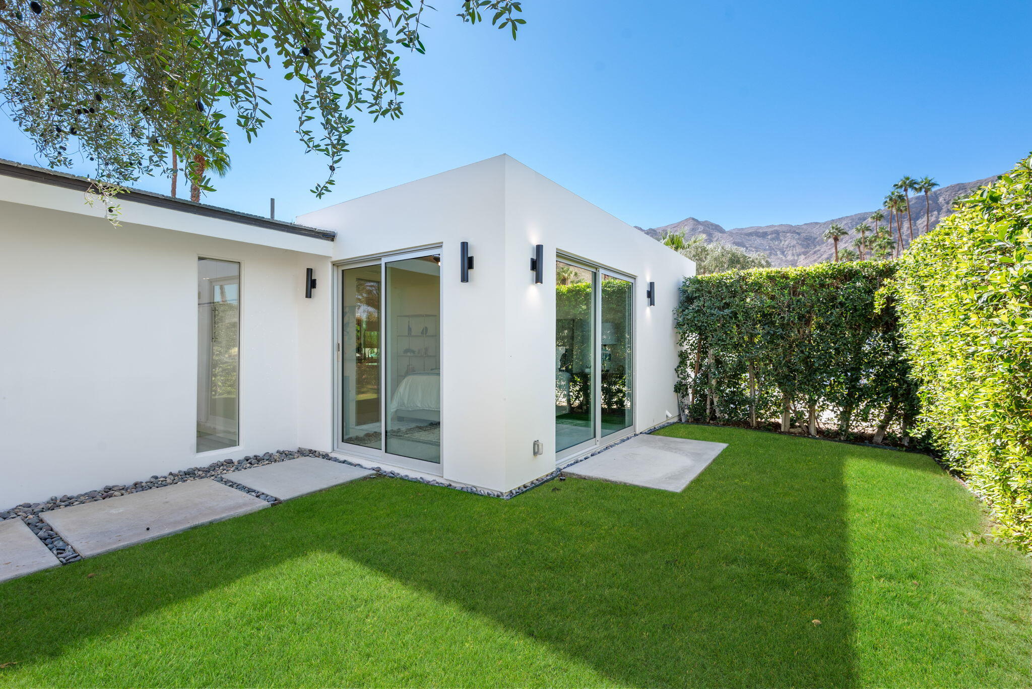 70288 Calico Road Rancho Mirage, CA 92270 - Photo 62 of 72 a view of an house with backyard space and garden