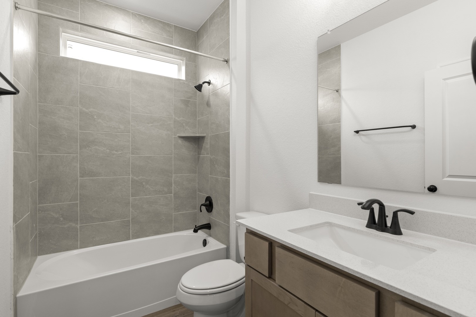 3717 Pin Oak Hills Seguin, TX 78155 - Photo 15 of 22 a bathroom with a sink a toilet and a bathtub