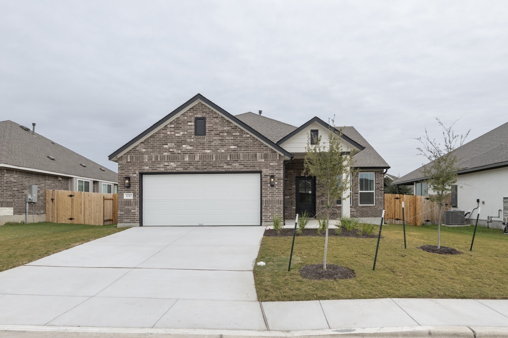 3717 Pin Oak Hills Seguin, TX 78155 - Photo 3 of 22 a front view of a house with garage