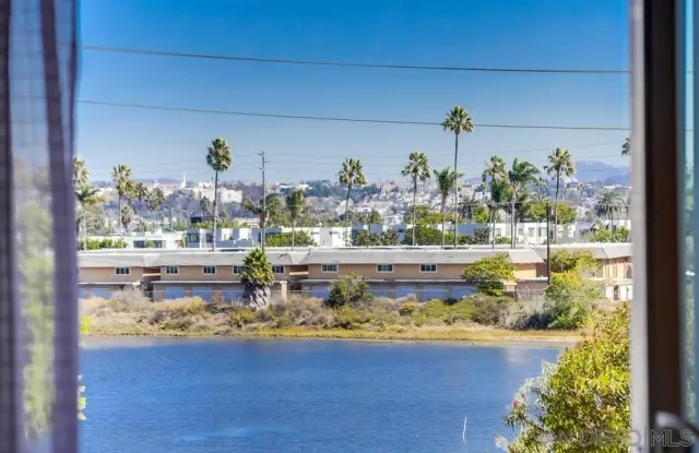 a view of swimming pool from a window
