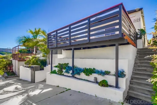a view of a house with a street