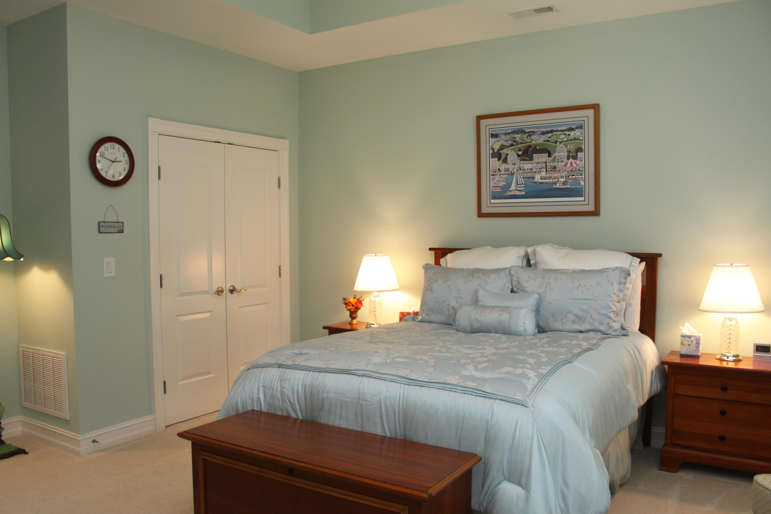 159 Calypso Road Moneta, VA 24121 - Photo 16 of 72 a bedroom with a bed and a lamp on dresser