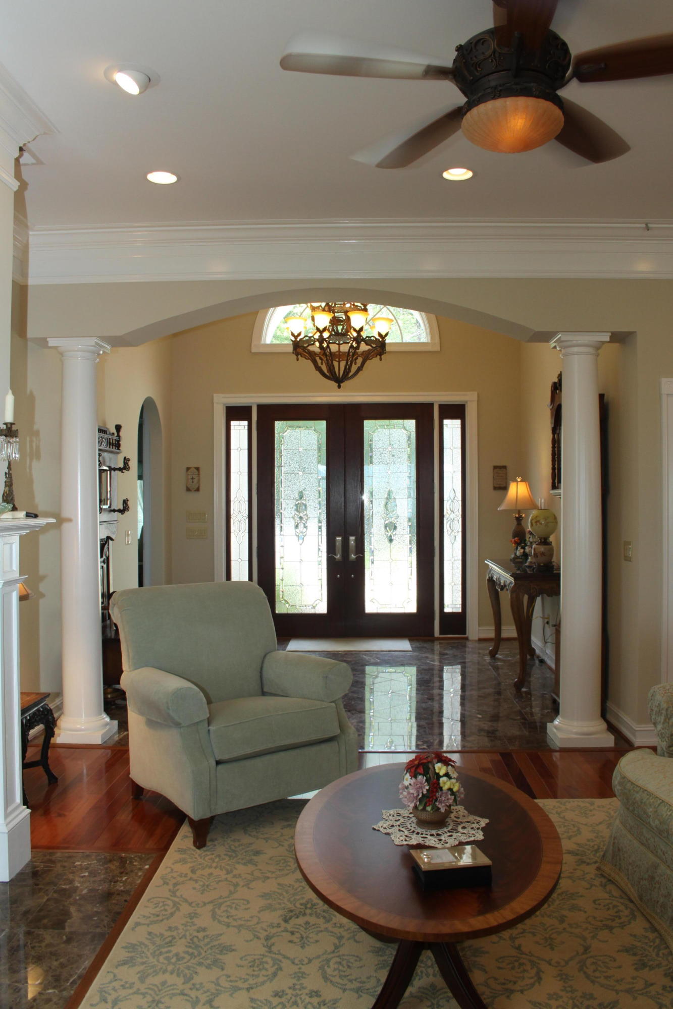 159 Calypso Road Moneta, VA 24121 - Photo 34 of 72 a living room with fireplace furniture and a chandelier