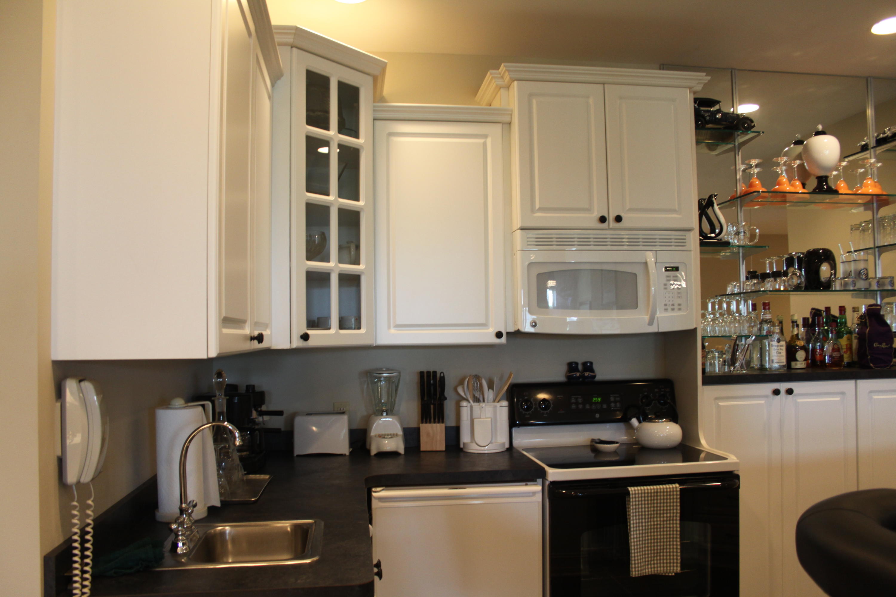 159 Calypso Road Moneta, VA 24121 - Photo 39 of 72 a kitchen with stainless steel appliances granite countertop a stove a sink and a microwave