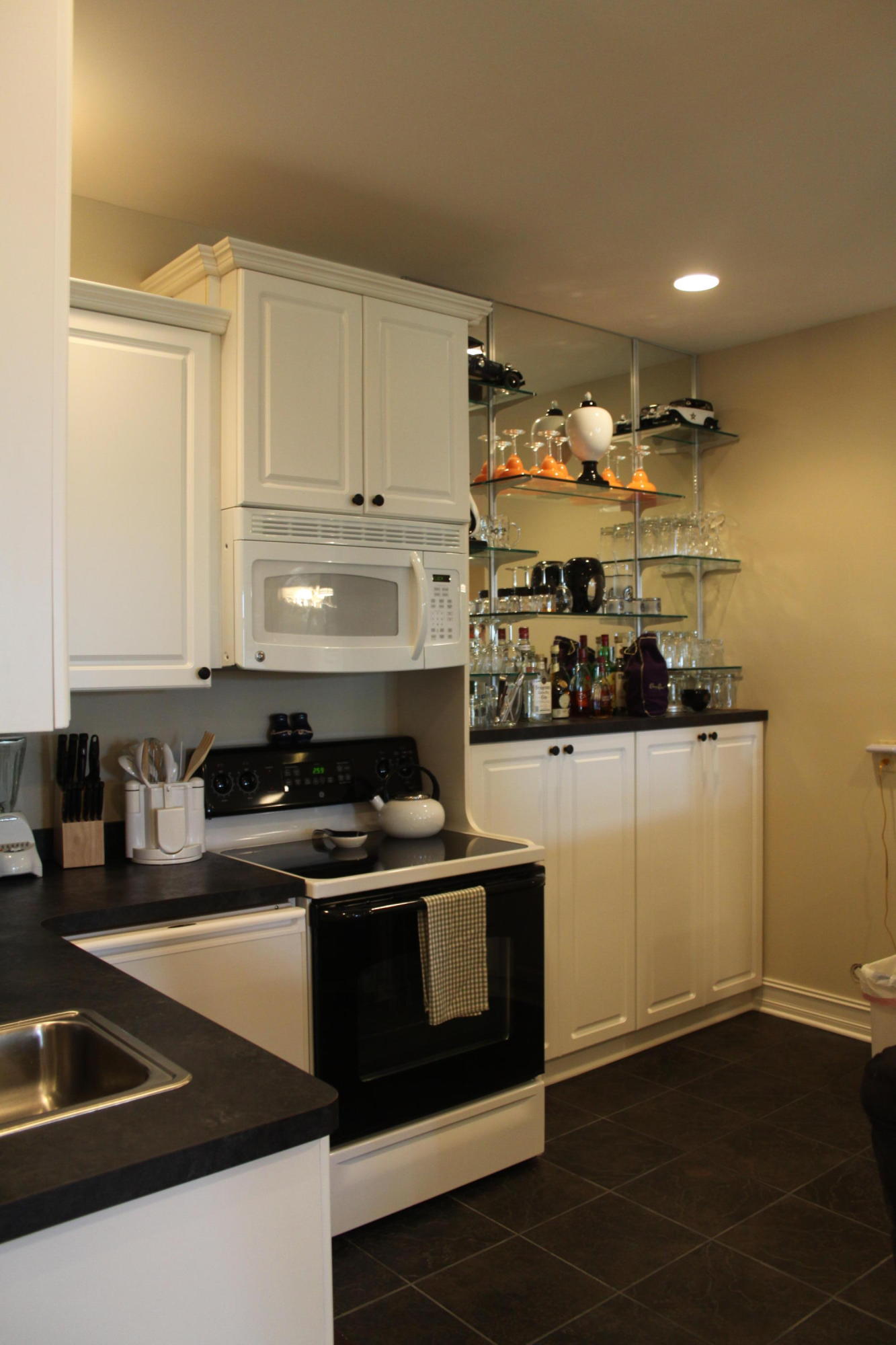 159 Calypso Road Moneta, VA 24121 - Photo 42 of 72 a kitchen with stainless steel appliances granite countertop a stove and a refrigerator