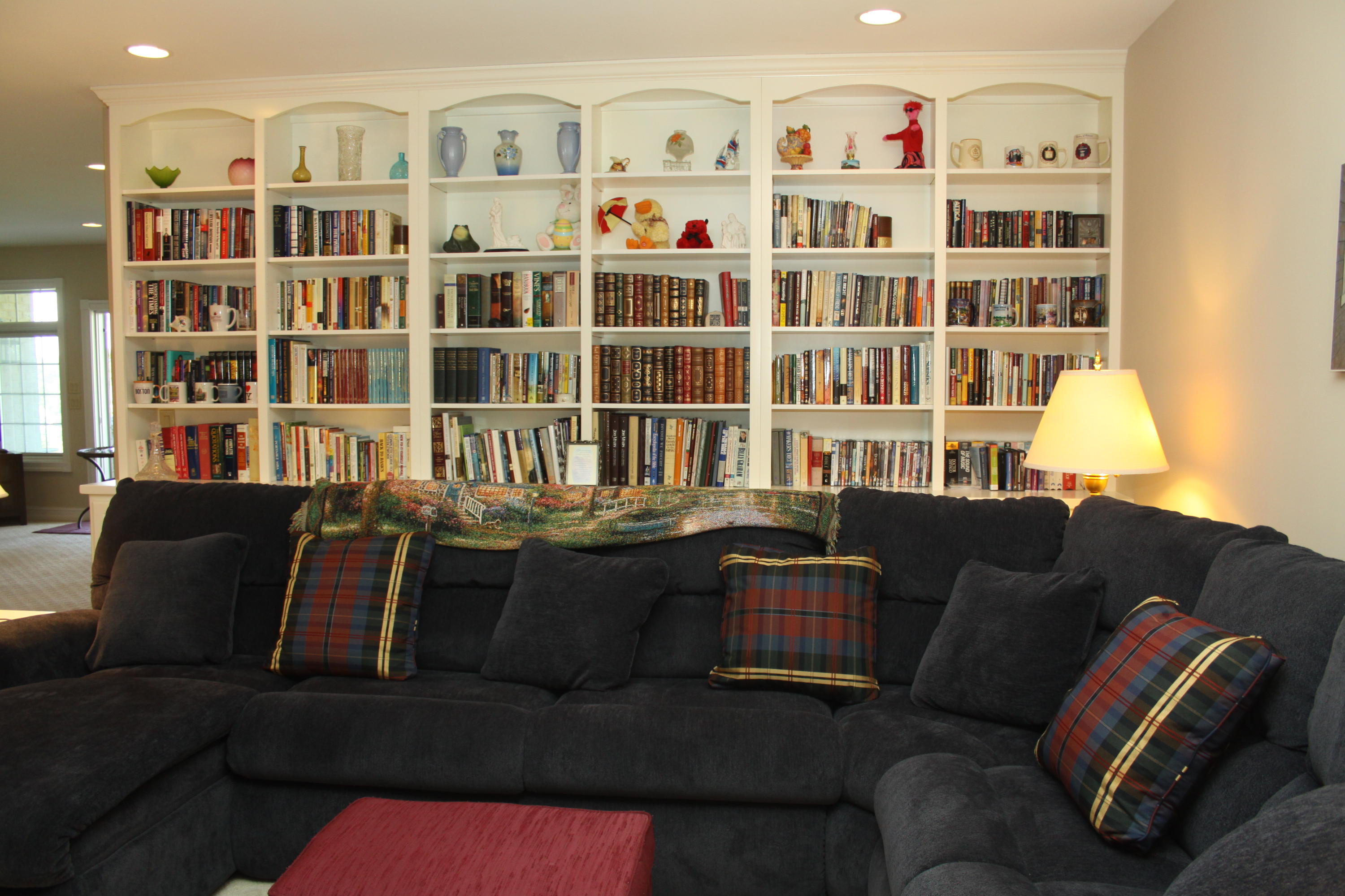 159 Calypso Road Moneta, VA 24121 - Photo 43 of 72 a living room with furniture and a book shelf