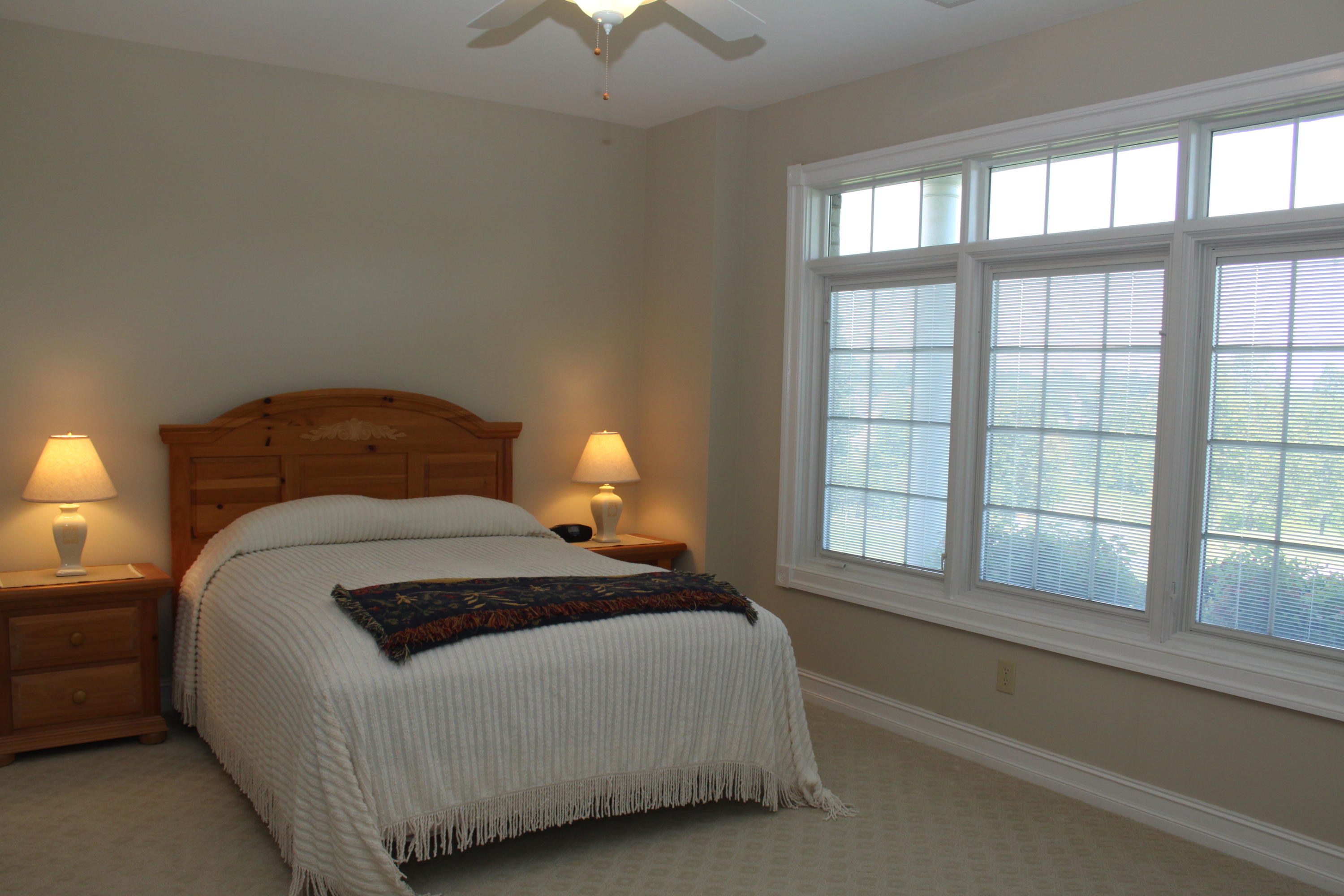 159 Calypso Road Moneta, VA 24121 - Photo 47 of 72 a bedroom with a bed and a large window